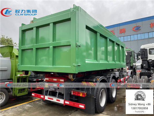 SINOTRUK HOWO 8x4 LHD Hydraulic Hooklift Garbage Truck With Folded Arm Crane