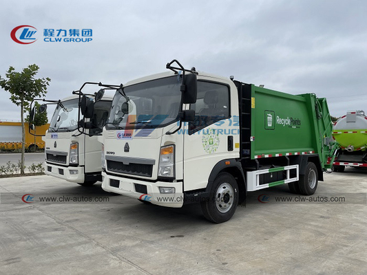 140HP 6m3/6000liters/6cbm Howo RHD Rear Load Garbage Truck Waste Collector Truck